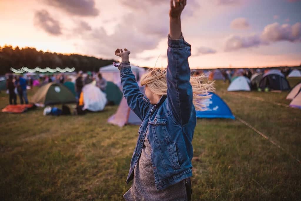 A woman dancing at a music festival